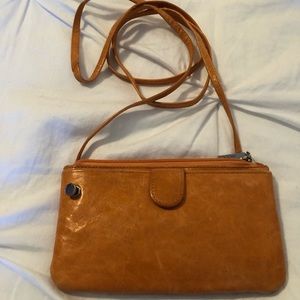 Orange Hobo International crossbody wallet